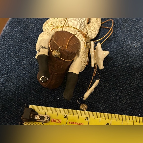 Wild western Santa hangs from gold thread with stars and bells. - Picture 8 of 8